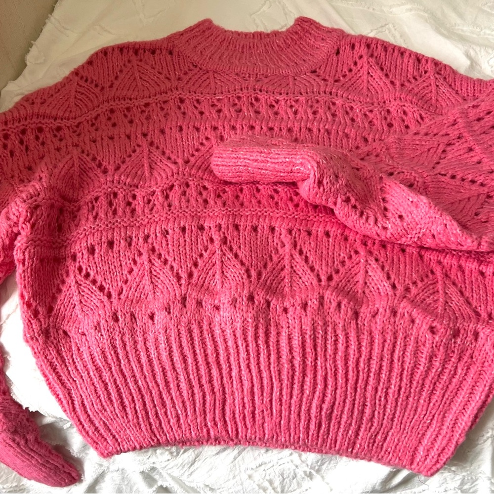 Pink Crew Neck Sweater with Intricate Knit Pattern